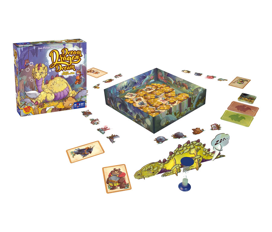 Gelber Drache liegt neben Spiel »Dream Dragon Dream«.