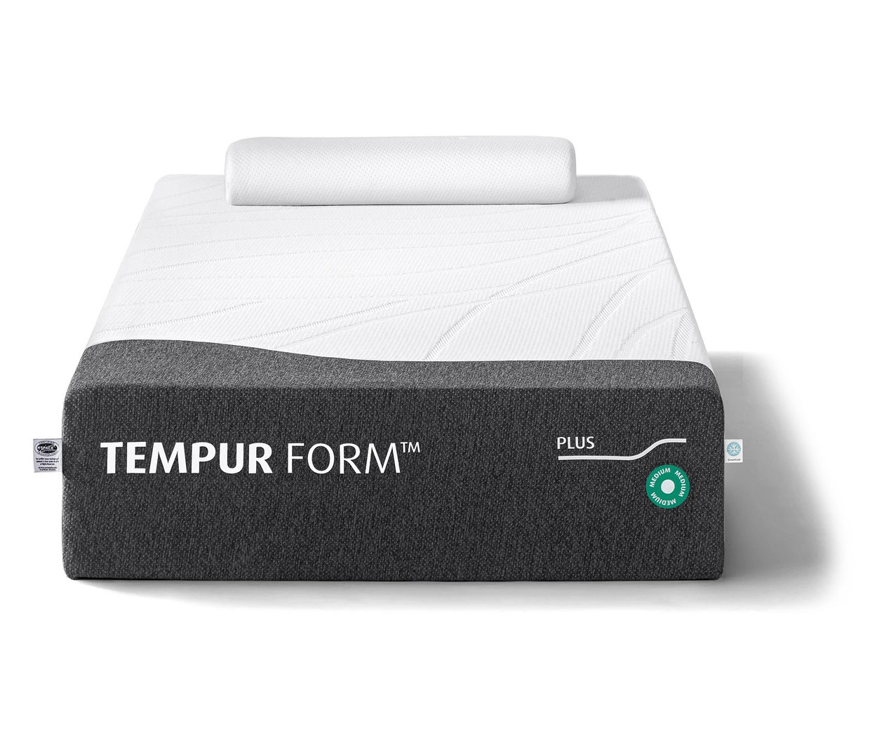 Eine Tempur Form™ Plus Matratze, Medium, mit einem weißen Kissen darauf.