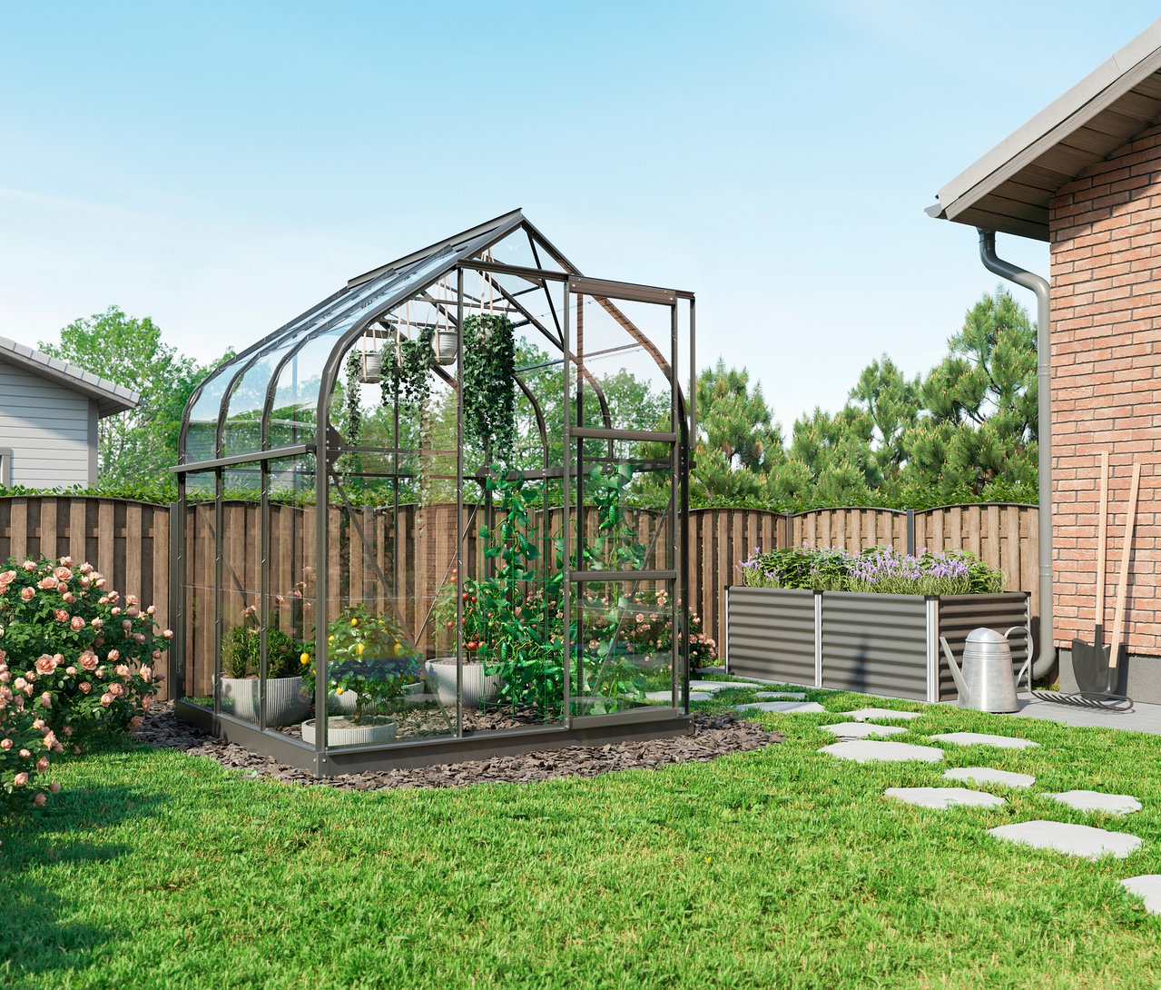 Vitavia Gewächshaus Orion ESG 3,8 m² inkl. Rahmenfundament mit Pflanzen im Garten neben einem Haus.