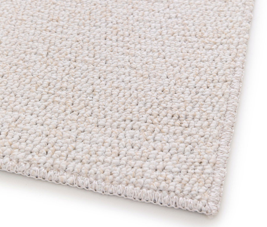 Detailaufnahme eines cremefarbenen Teppichs "Daisy".