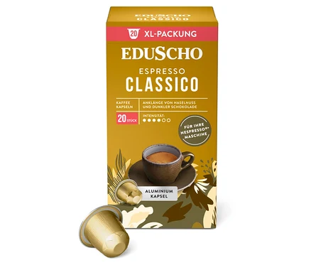 Eine Packung Eduscho Espresso Classico Kaffeekapseln mit einer Tasse Kaffee und zwei Kapseln im Vordergrund.