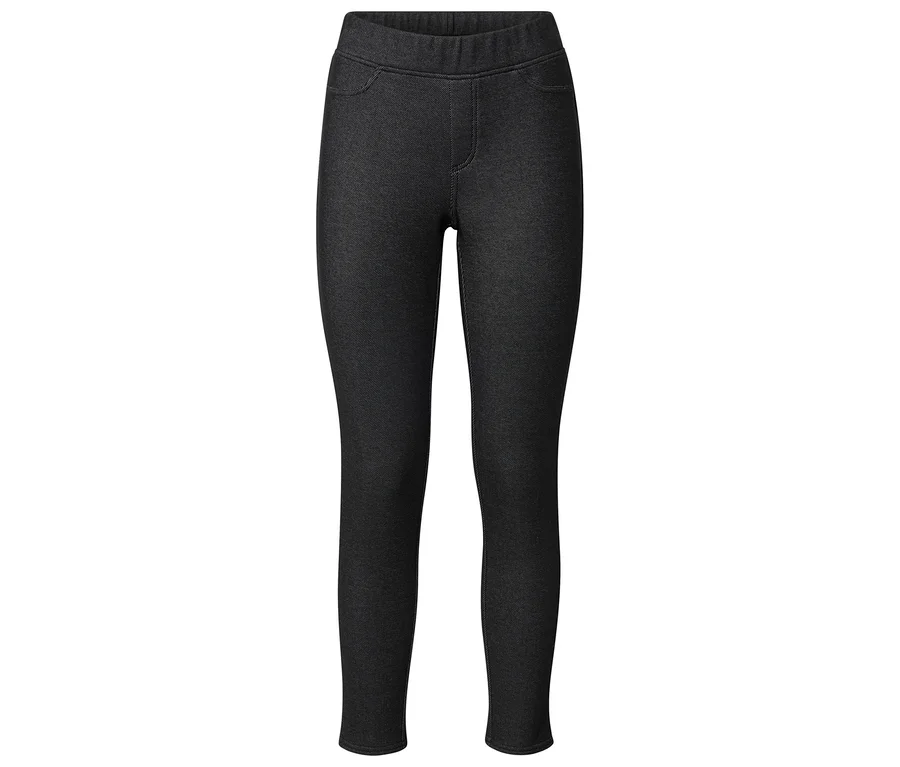 Schwarze Leggings mit angedeuteten Taschen und angedeutetem Reißverschluss.