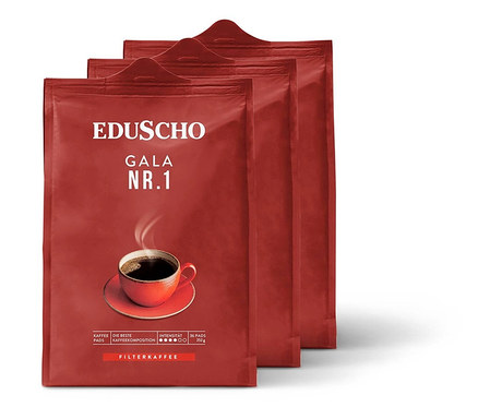Drei Packungen Eduscho Gala Nr. 1 Kaffeepads liegen nebeneinander.