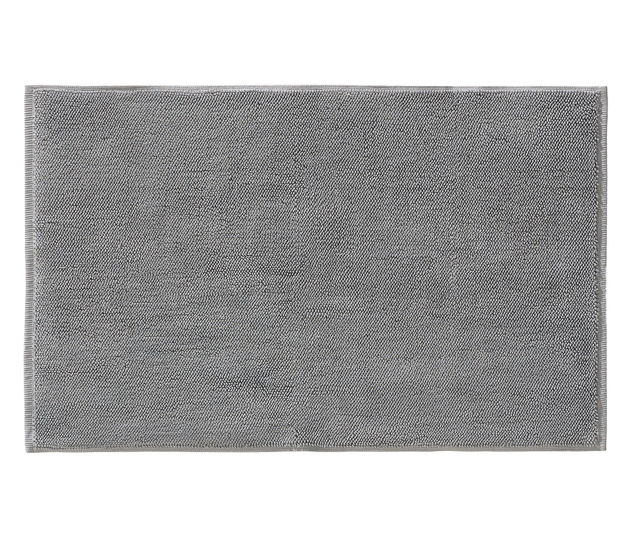 Graue Badematte mit getufteter Textur.