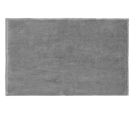 Graue Badematte mit getufteter Textur.