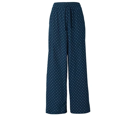 Marineblaue, weite Hose mit weißen Punkten und Kordelzug.