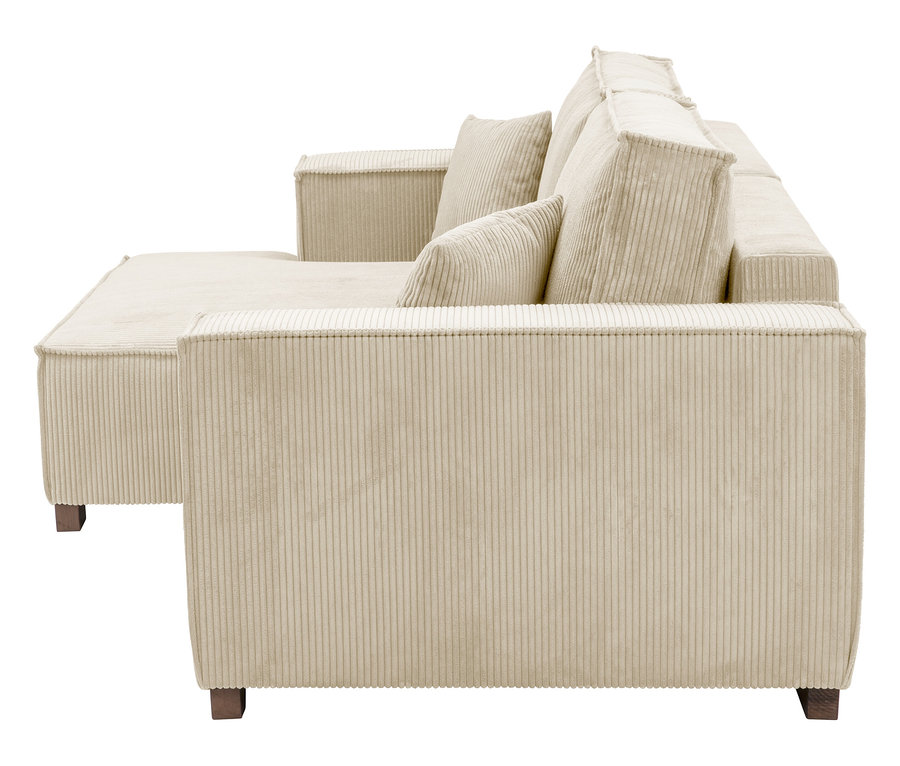 Beiges Cordsofa mit losen Kissen und Ottomane von der Seite gesehen.