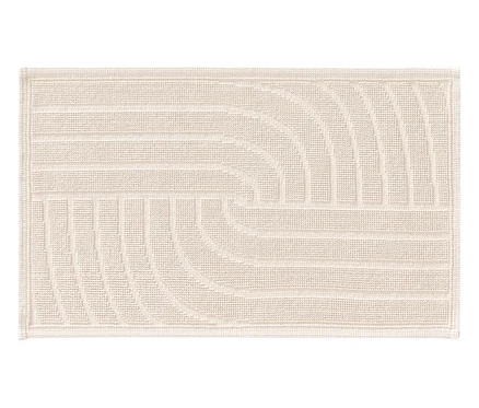 Ein rechteckiger, cremefarbener Teppich mit einem geometrischen Design aus Linien und Bögen.