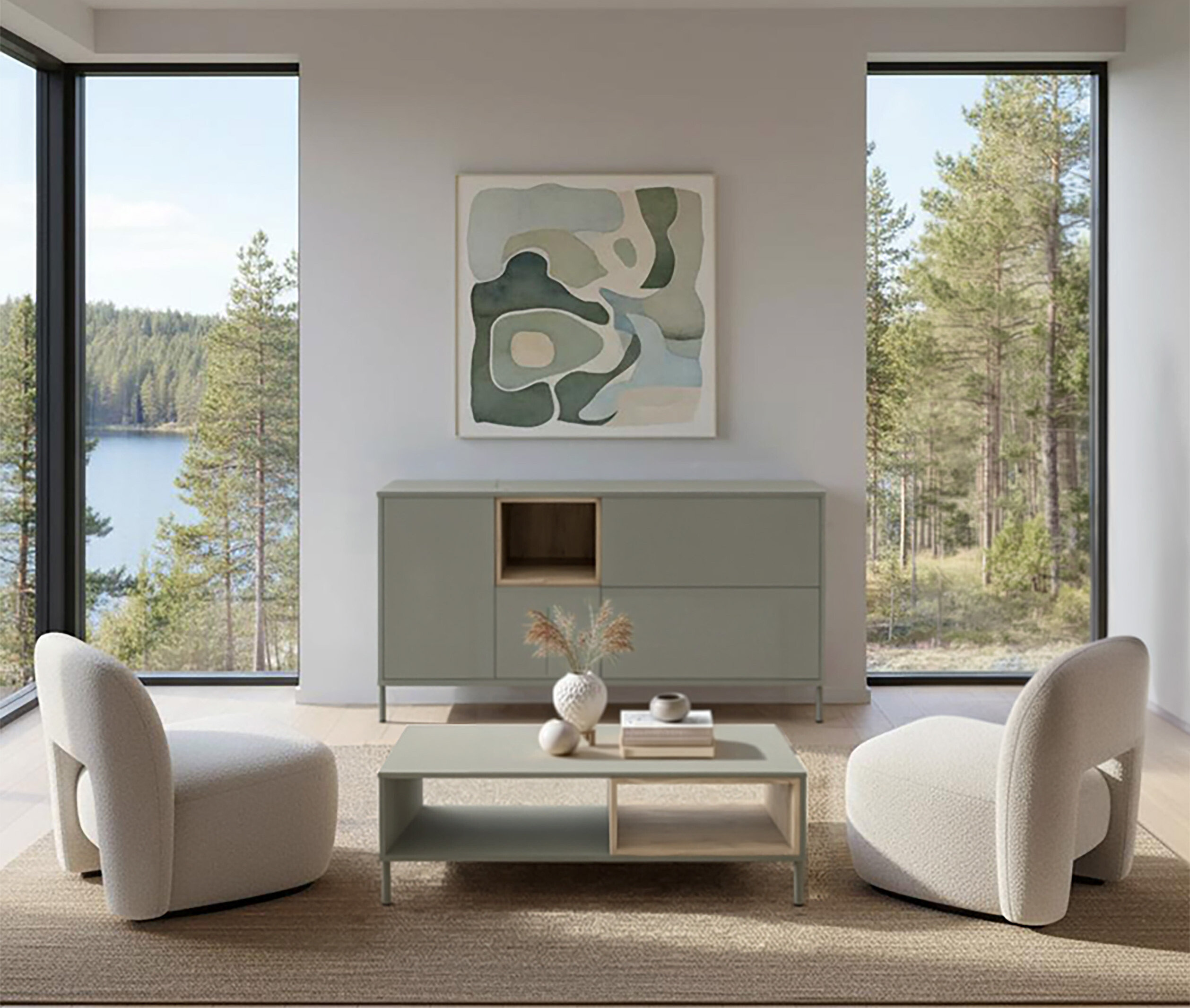 Wohnzimmer mit salbeigrünem »Hygge« Sideboard und Couchtisch. Zwei Sessel stehen auf einem Teppich vor dem Fenster mit Seeblick.