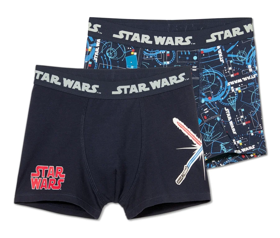 Zwei Slipboxer »Star Wars«. Einer ist dunkelblau mit rotem Logo und Lichtschwert, der andere mit blauem geometrischen Muster.