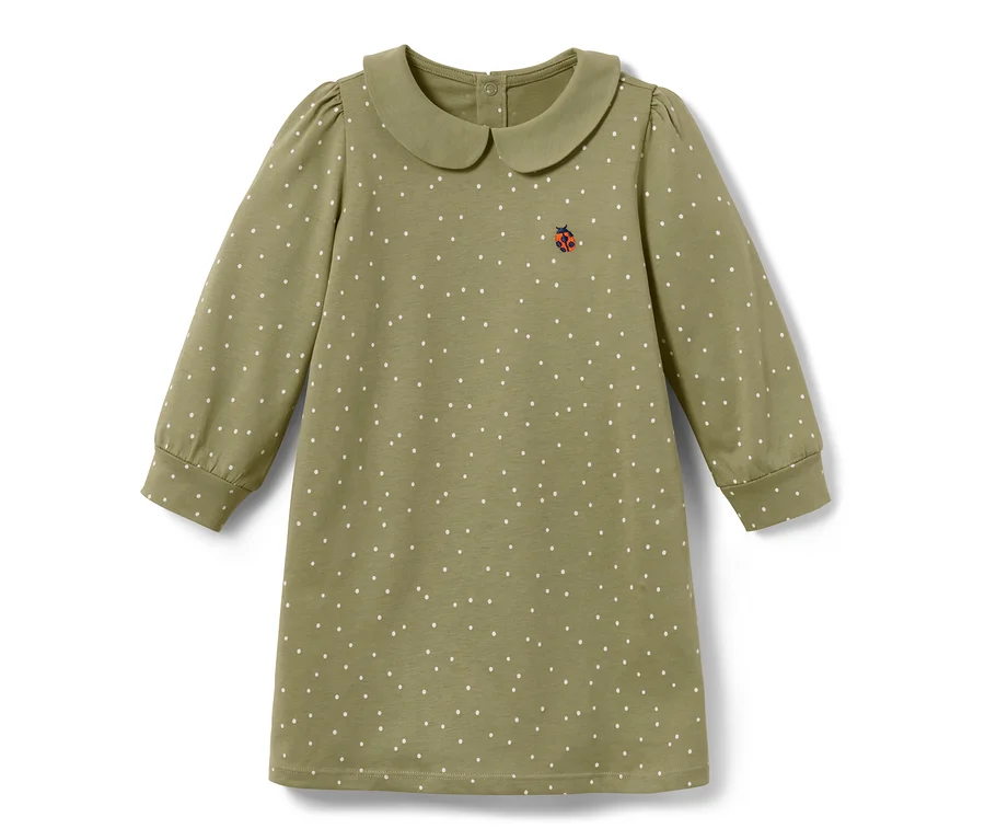 Grünes Kleinkinder-Jerseykleid mit weißen Punkten und einem Käfer.