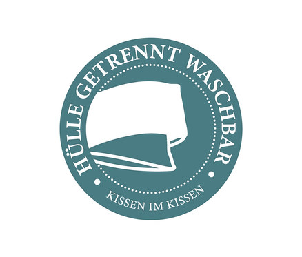 Blaugrüner Kreis mit weißem Kissensymbol und dem Text "HÜLLE GETRENNT WASCHBAR KISSEN IM KISSEN".
