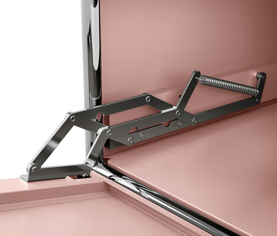 Detail eines Deckelöffnungsmechanismus im Inneren eines Möbels mit rosafarbenen Flächen.