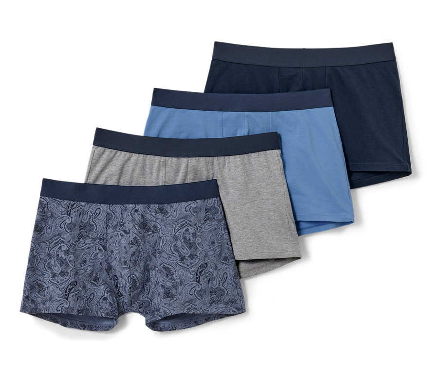 Vier Slipboxer: eine mit blauem Paisleymuster, eine graue, eine hellblaue und eine dunkelblaue.