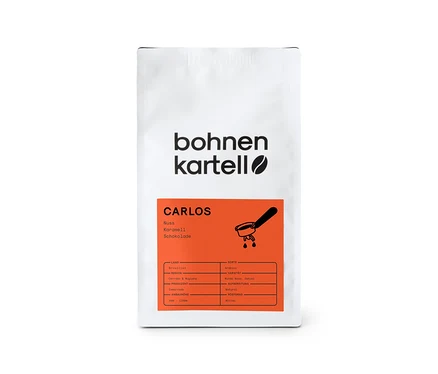 Weiße Packung bohnenkartell - Carlos Espresso - 250 g Ganze Bohne mit Infos zu Nuss, Karamell und Schokolade.