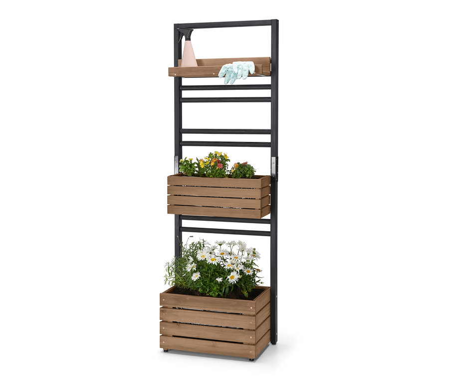 Pflanzwand »Elin« mit Blumen in Pflanzkästen und Zubehör auf einem Regal.