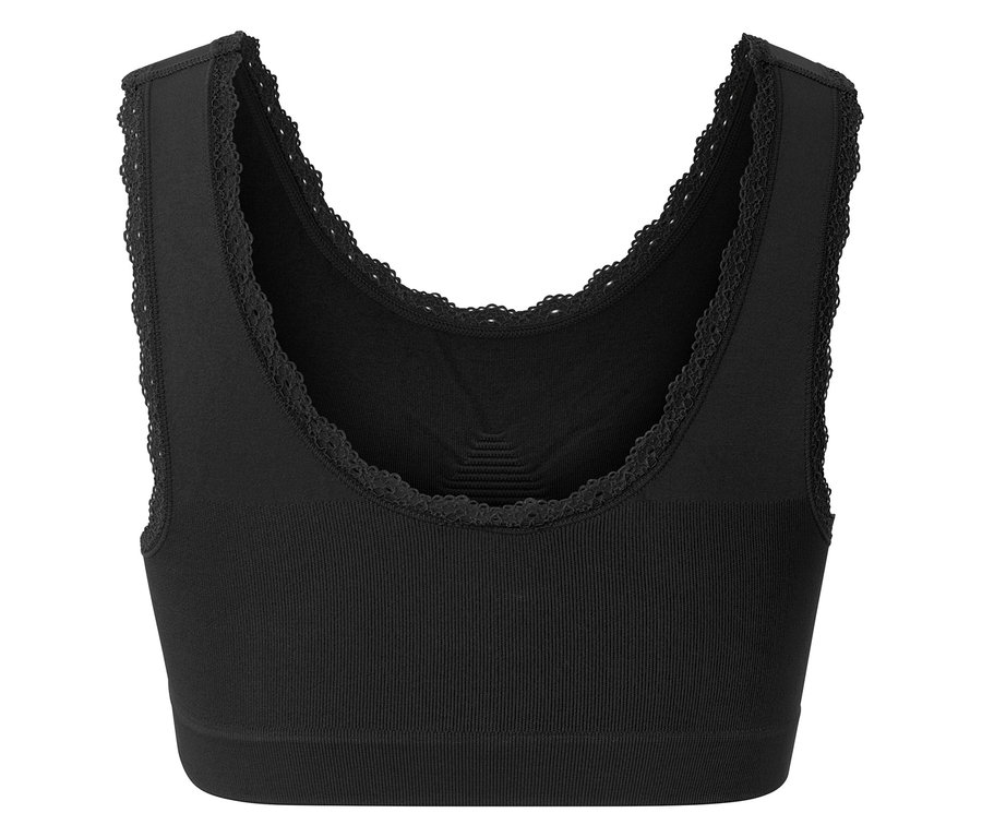 Detailaufnahme eines schwarzen Sport-BHs mit Spitzenbesatz.