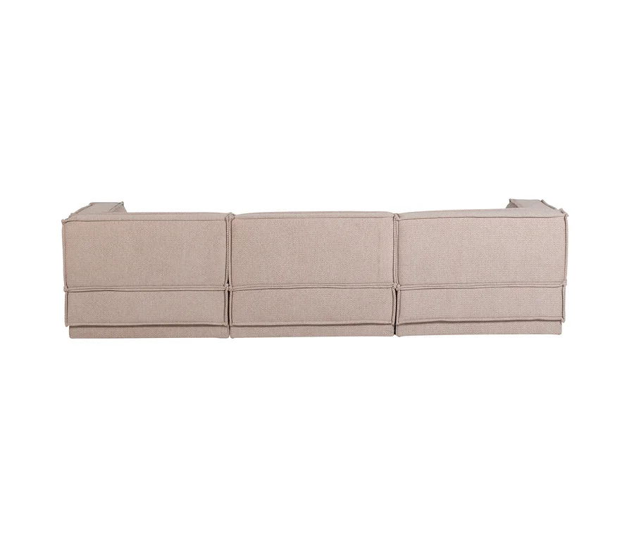 Rückansicht eines beigen modularen Sofas mit drei Abschnitten und sichtbaren Nähten.