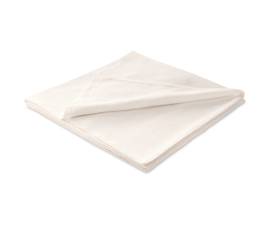Gefaltete Tagesdecke.