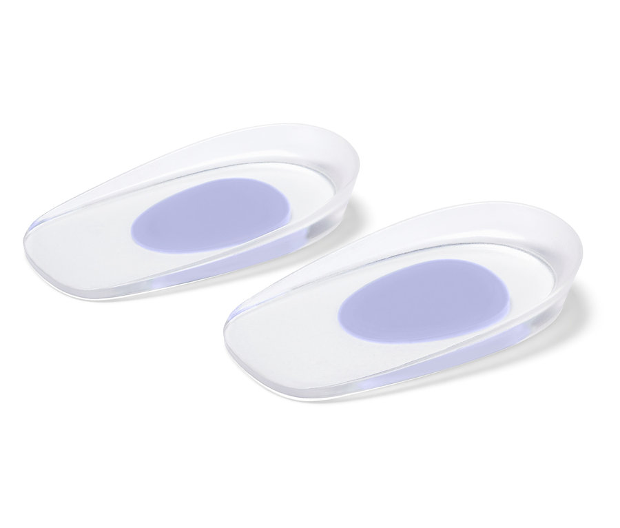Zwei transparente Gel-Fersenpolster mit lila ovalem Kissen auf weißem Hintergrund.
