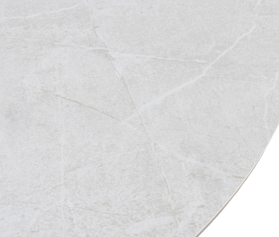 Detailaufnahme einer hellgrauen Tischplatte mit Marmormuster.