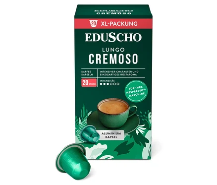 Eine Packung EDUSCHO Lungo Cremoso Kaffeekapseln mit einer Tasse Kaffee und einer Kapsel davor.