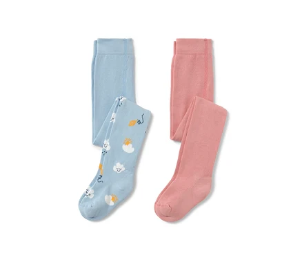 Zwei Kleinkind-Strumpfhosen, eine hellblau mit Wolken-, Sonnen- und Drachenmuster, die andere rosa.