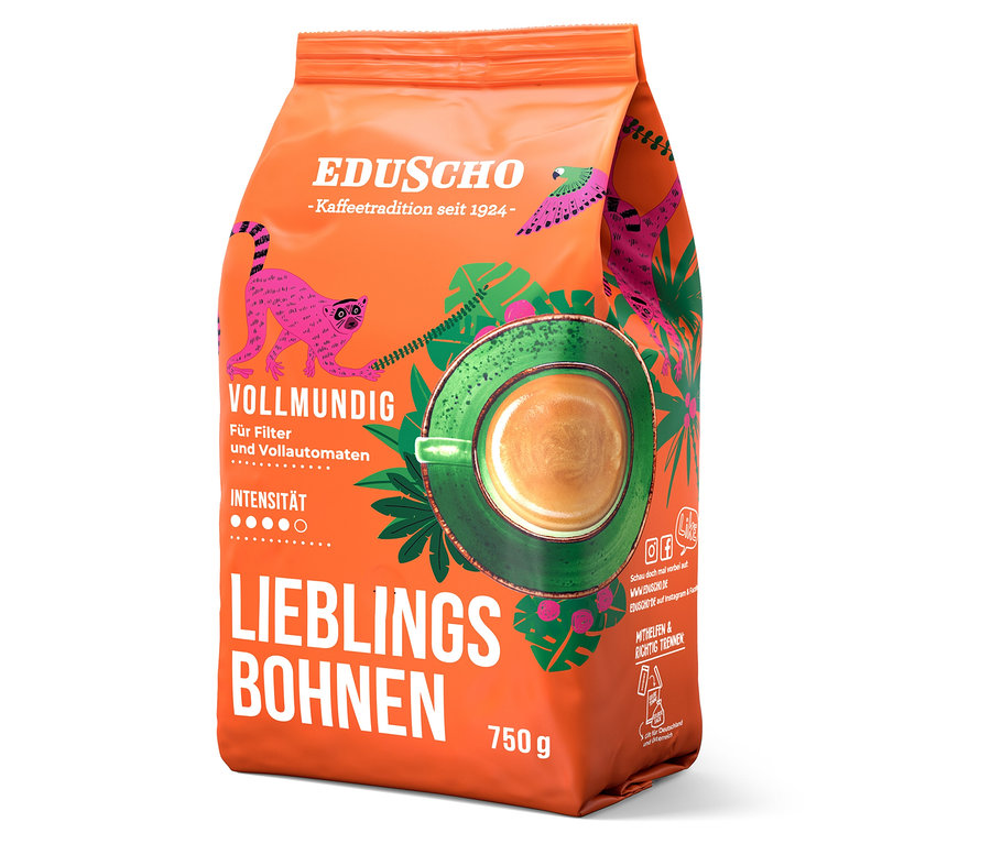 Orangefarbene Packung Eduscho Lieblingsbohnen Vollmundig mit einer Abbildung einer Tasse Kaffee und tropischen Motiven.