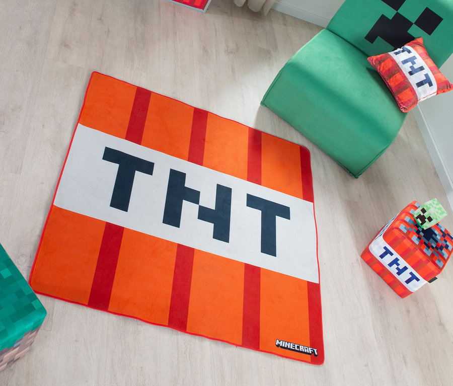 Draufsicht eines Kinderzimmers mit roba Minecraft Teppich »TNT«, grünem Sessel und Aufbewahrungsboxen mit Minecraft-Motiven.