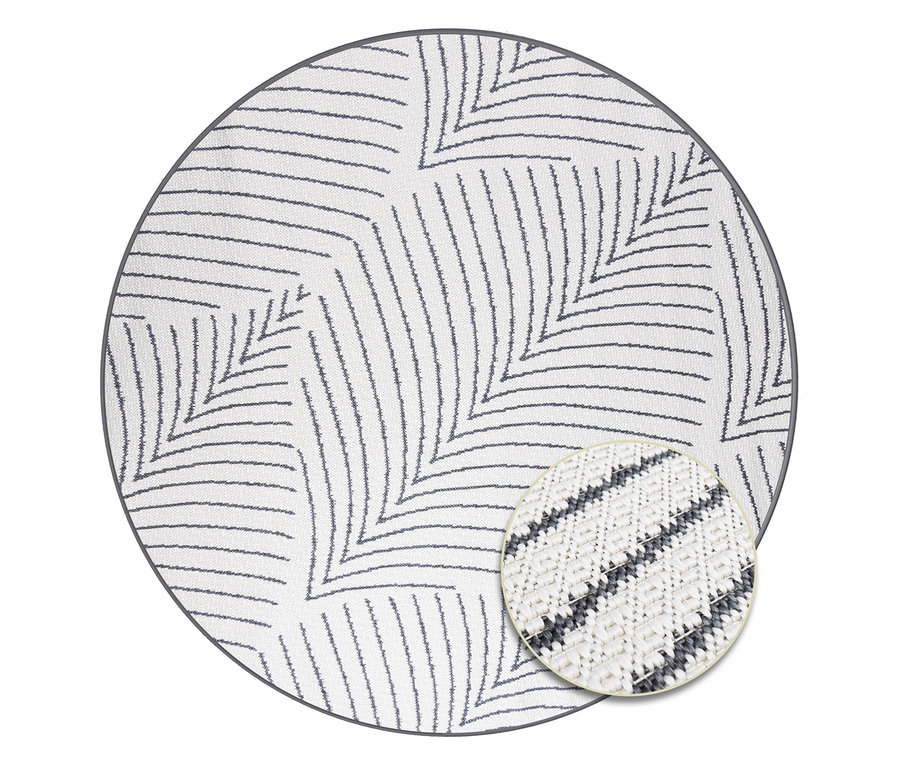 Runder Teppich mit abstraktem Blattmuster in Weiß und Grau.
