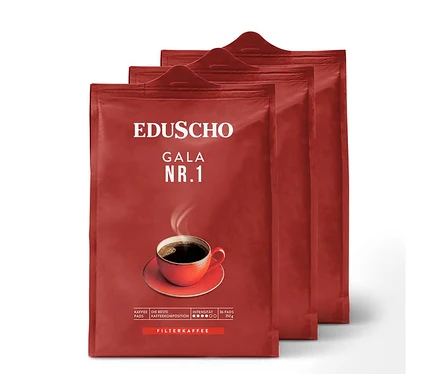 Drei Packungen Eduscho Gala Nr. 1 Kaffeepads liegen nebeneinander.