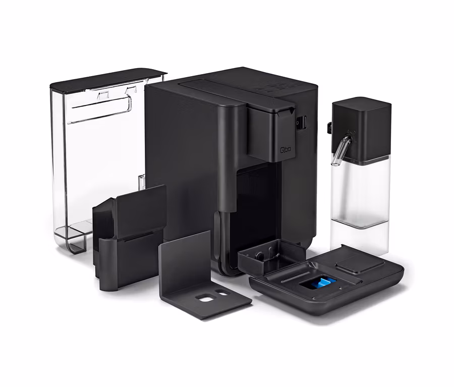 Ein schwarzer Qbo MILK MASTER Velvet Black Kaffeevollautomat mit abnehmbaren Komponenten.