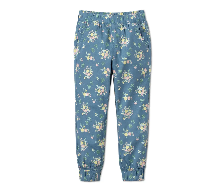 Blaue Schlupfhose mit Blumenmuster.
