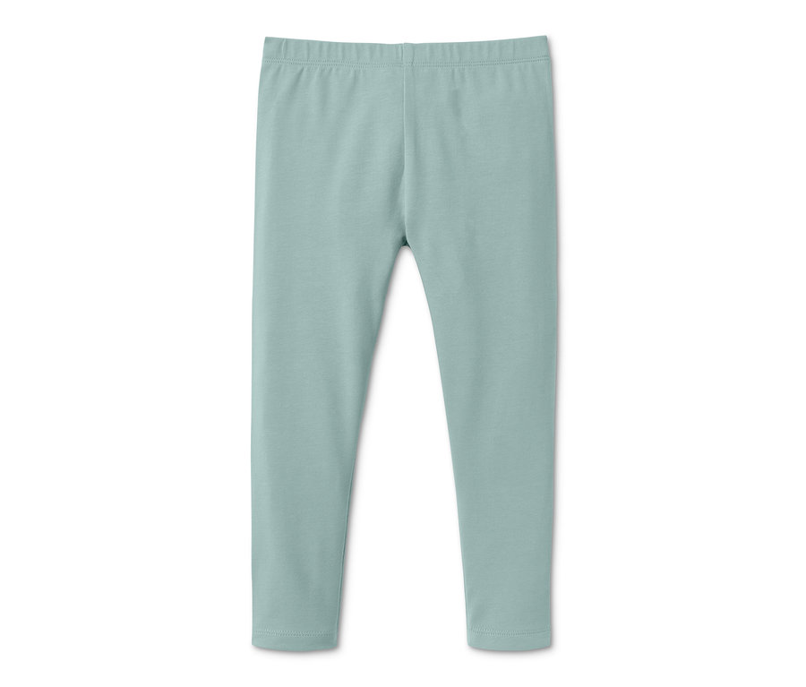 Hellgrüne Jersey-Leggings.