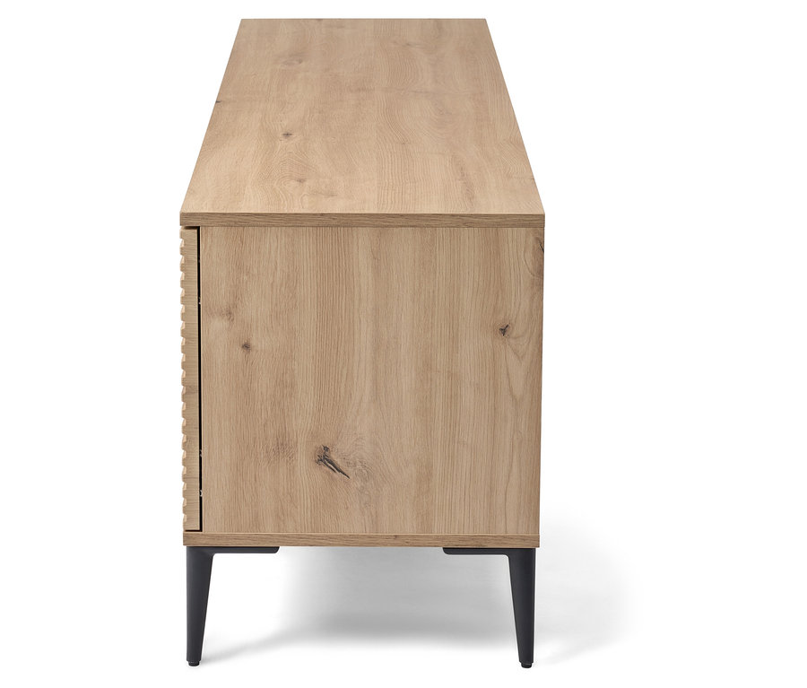 Seitenansicht einer hellen Holzkommode mit schwarzen Beinen.