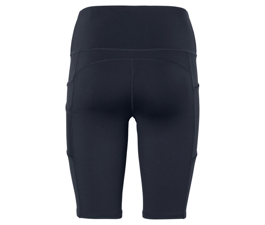 Nahaufnahme der Rückseite einer eng anliegenden, marineblauen Radhose mit hoher Taille und Seitentaschen.