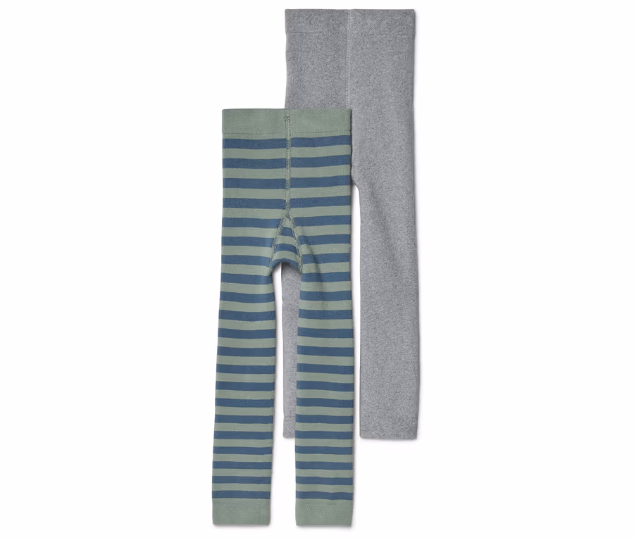 Zwei Leggings liegen nebeneinander, eine grau und eine grün-blau gestreift.