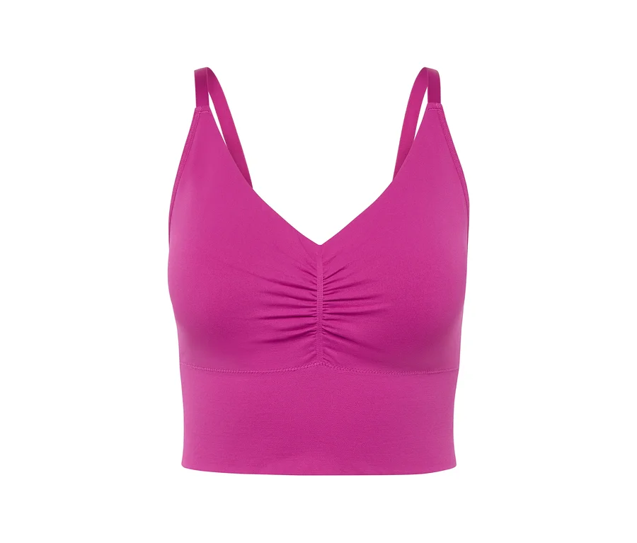 Detailansicht eines pinkfarbenen Sport-BHs mit dünnen Trägern.