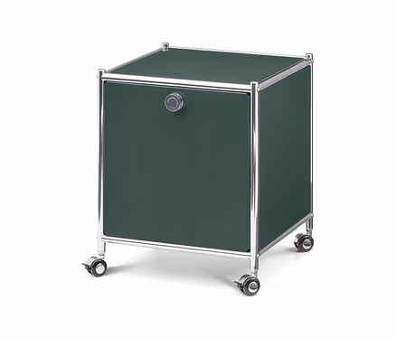 Dunkelgrüner, würfelförmiger Rollcontainer mit einer Tür, einem runden Griff und einem verchromten Rahmen auf Rollen.
