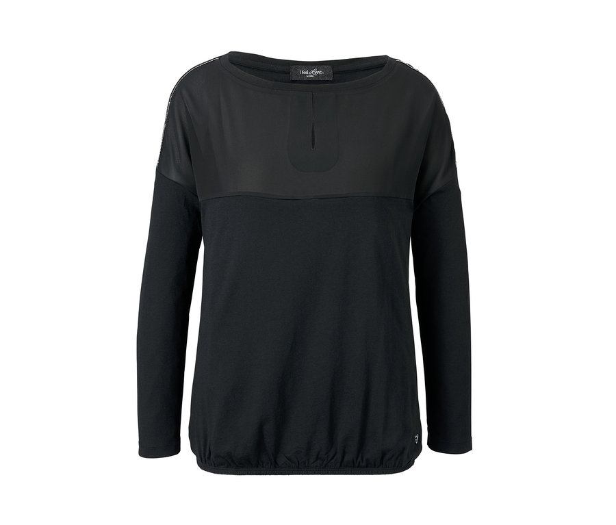 Schwarzes Blusenshirt mit Webeinsatz.