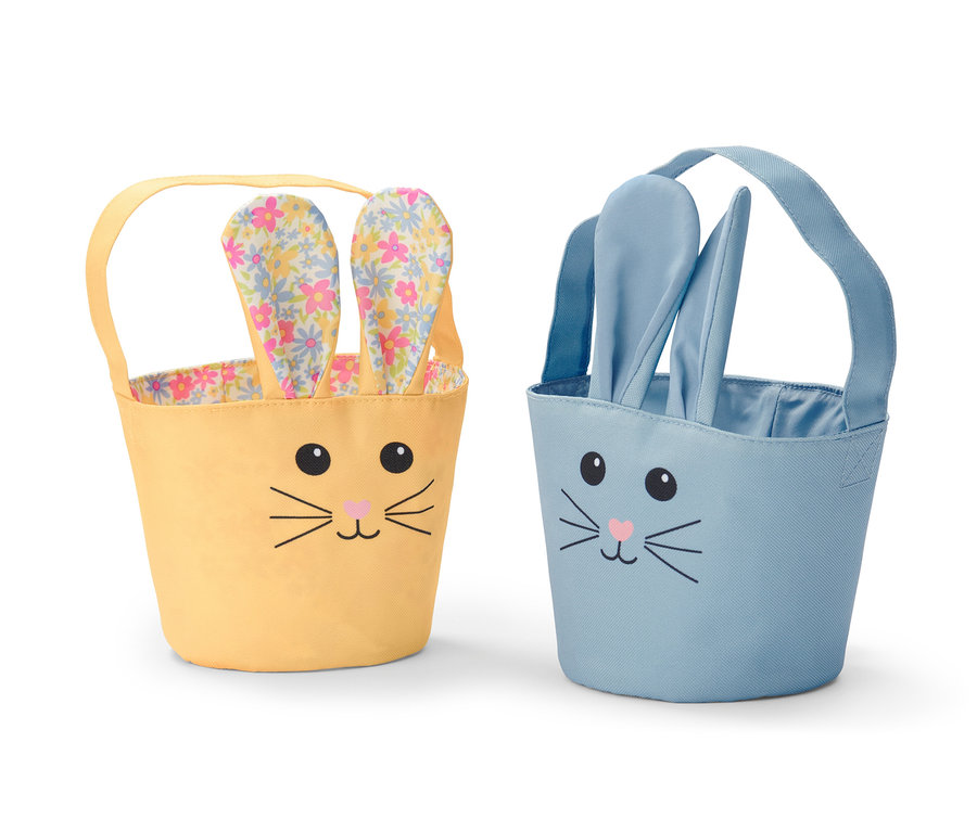 Zwei Osterei-Sammeltaschen: eine gelbe mit floralen Ohren und eine blaue mit blauen Ohren.