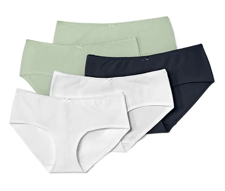 Fünf Pantys in Grün, Weiß und Dunkelblau.