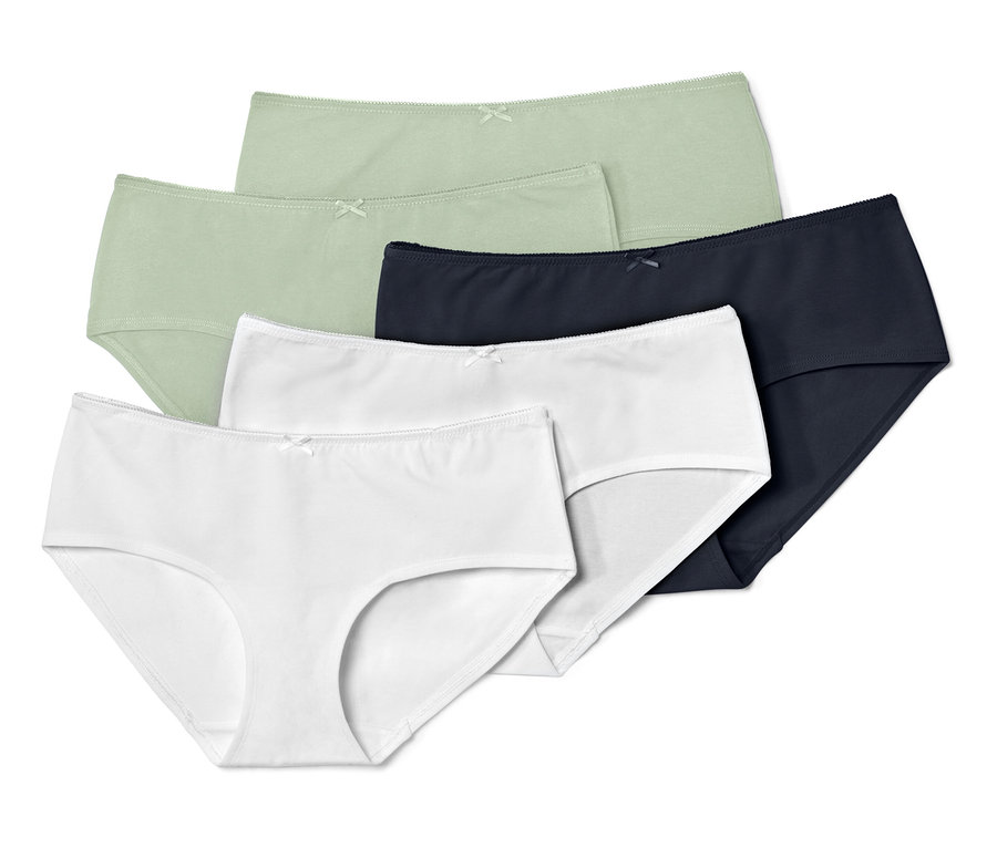 Fünf Pantys in Grün, Weiß und Dunkelblau.