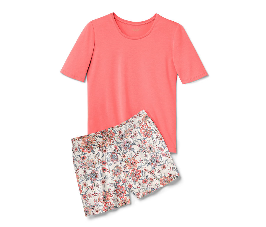 Ein Shorty-Pyjama in Papaya, bestehend aus einem T-Shirt und einer geblümten Shorts, liegt übereinander.