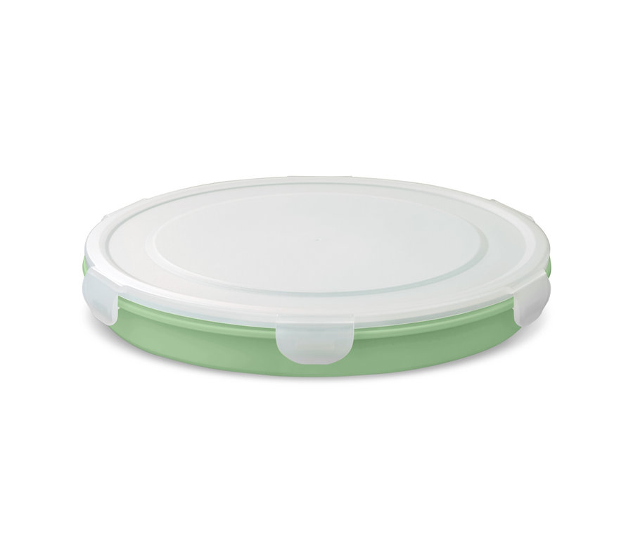 Eine grüne faltbare Salatschüssel mit weißem Deckel.