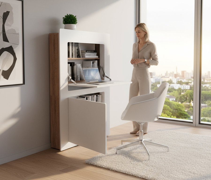 Frau steht neben einem weißen Roba Schreibtisch »Milano«, der an der Wand montiert ist und ein Laptop trägt.