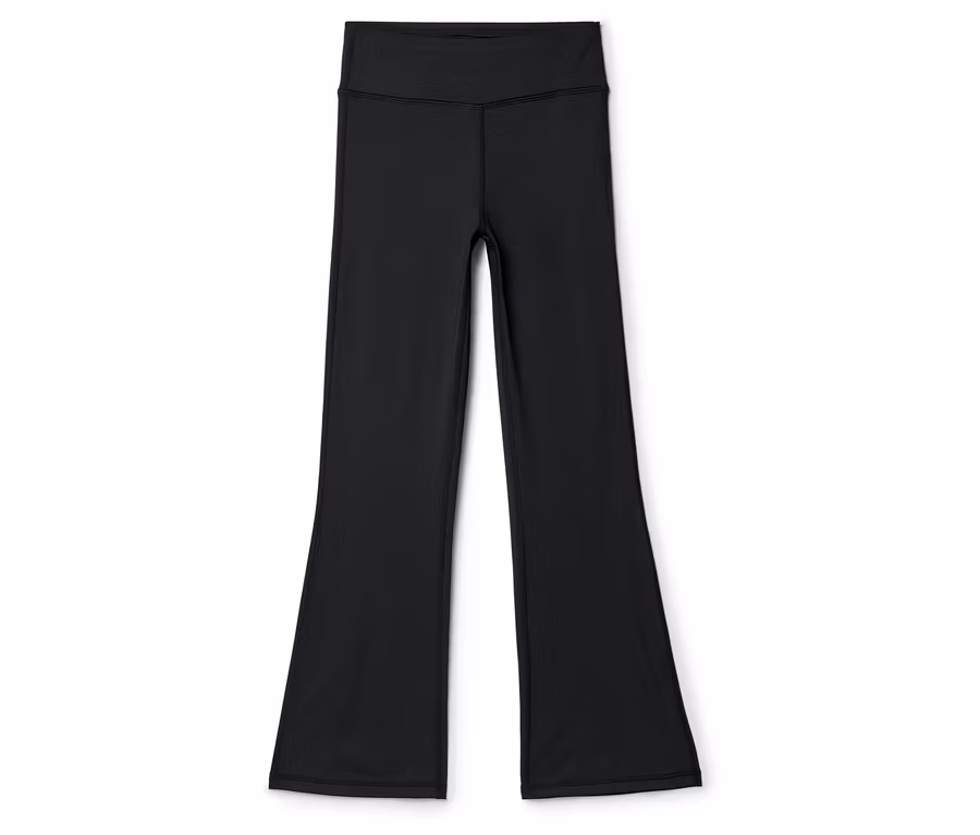 Schwarze High-Waist Schlagleggings.