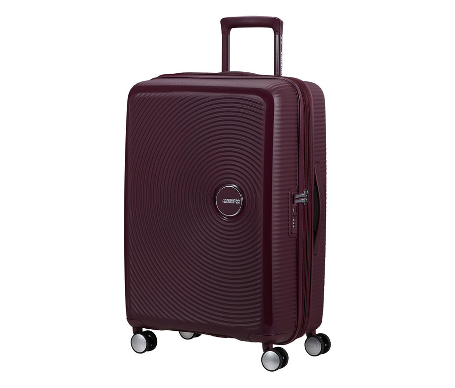 American Tourister Soundbox Spinner Hartschalen-Koffer in Wildkirschrot, mittel, mit spiralförmigem Muster und vier Rollen.