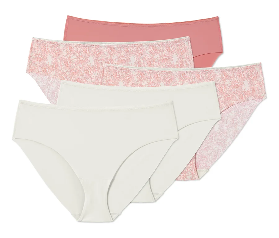 Fünf Magic-Cut-Slips in Creme, Rosa und mit Blumenmuster.