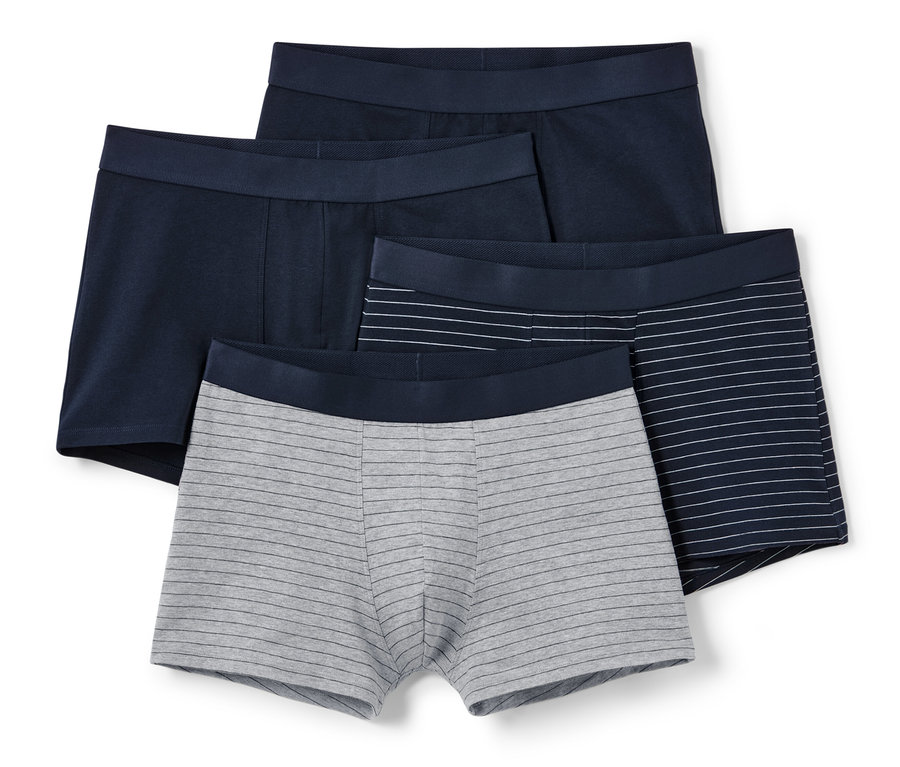 Vier Slipboxer: zwei marineblaue, eine grau gestreifte und eine marineblaue mit weißen Streifen.